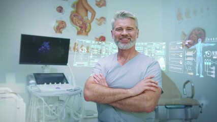 Smiling mature male doctor wearing scrubs while standing with crossed arms in medical office. Caucasian specialist posing near ultrasound machine with digital holographic patient data behind. - Powered by Adobe