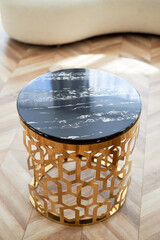 A golden chandelier with many light bulbs. Style, minimalism and luxury,