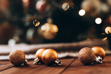 Warm christmas decor with golden ornaments