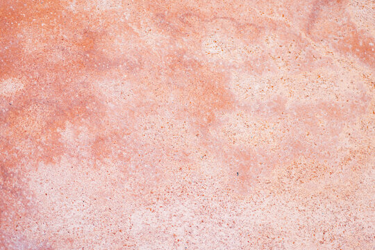 Abstract textured orange concrete surface background