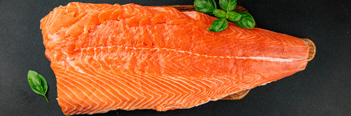 Salmon fillet raw red fish seafood dish natural tasty snack fresh delicious gourmet food background on the table rustic top view copy space pescetarian diet
