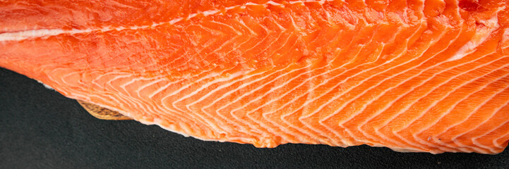 Salmon fillet raw red fish seafood dish natural tasty snack fresh delicious gourmet food background on the table rustic top view copy space pescetarian diet