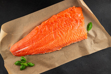 Salmon fillet raw red fish seafood dish natural tasty snack fresh delicious gourmet food background on the table rustic top view copy space pescetarian diet
