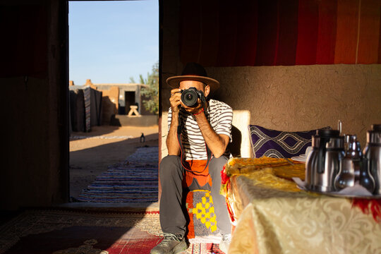 Man in traditional Berber tent at Sahara desert camp