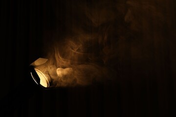 Professional lighting equipment without reflector and smoke on dark background. Space for text