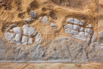 Abstract closeup of unusual shapes and patterns of rocks at Point Lobos State Natural Reserve in Carmel-By-The-Sea, California
