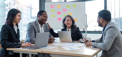 diverse business workgroup designers team with asian woman leader discuss paperwork financial report statistical data, forecasting working on common project. Brainstorm, briefing activity concept