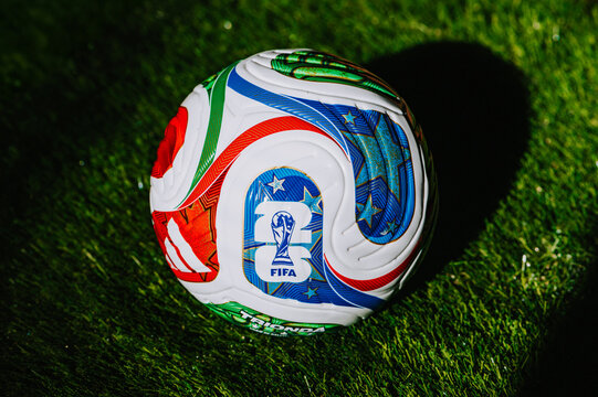 Full view of the FIFA World Cup 2026 Trionda ball on green turf &mdash; official football of the tournament in North America