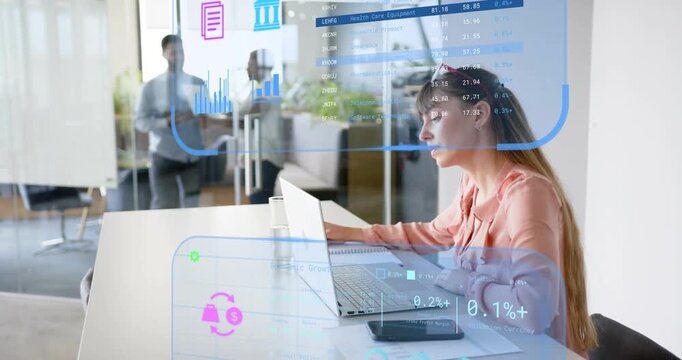 Mid-adult female opening laptop and engaging floating financial charts analyzing metrics