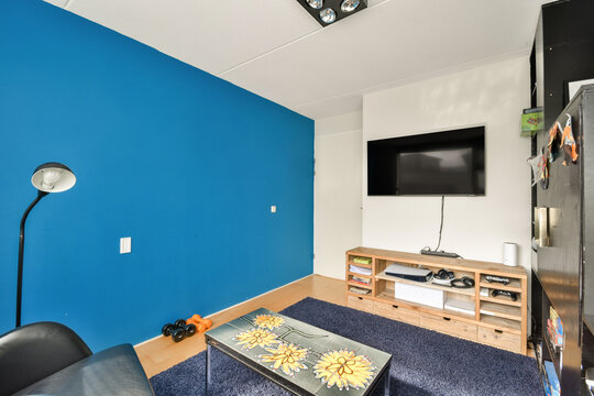 Modern Living Room with Bright Blue Walls