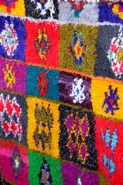Santa Fe, New Mexico, United States. Colorful Moroccan rug at the Santa Fe International Folk Art Market. 