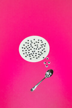 Conceptual depiction of a plate filled with googly eyes