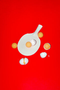 Conceptual image of ping pong rackets and eggs