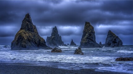 Dramatic coastal landscape featuring jagged rock formations and turbulent waves under cloudy skies