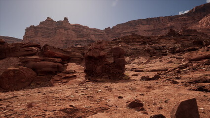 Under a bright sun, the rugged terrain showcases striking red rocks and dramatic cliffs. The scene captures the vast beauty of the desert, inviting exploration and wonder.
