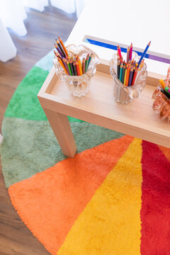 Colorful children's study area with vibrant rug