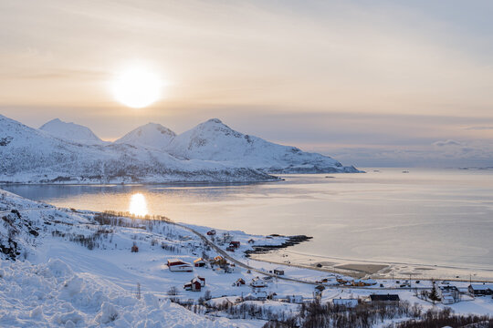 Grotfjord point view during winter with snowy mountains and sea - Powered by Adobe