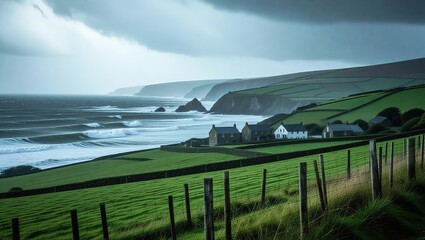 Coastal landscape with green fields and ocean waves under cloudy sky.