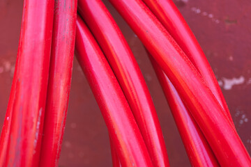 Red electrical cables in urban construction