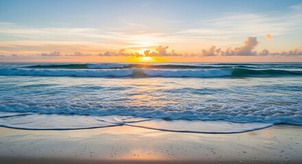 Fototapeta premium Stunning sunrise over the ocean with gentle waves washing ashore on golden sand beach perfect for travel ads