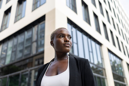 Confident businesswoman in urban setting
