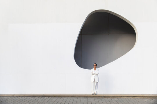Businesswoman in a sleek modern urban environment