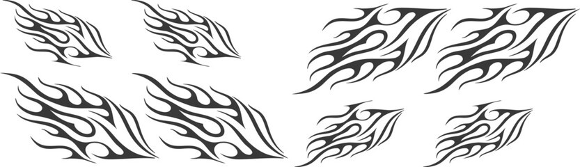 Tribal flame tattoo set vector illustration, black abstract fire patterns for car decals, body art, motorcycle graphics, or t-shirt design, bold flame ornament collection in various shapes.