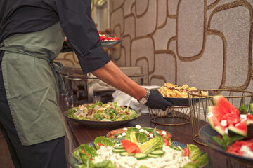 Buffet Line with Chafing Dishes at Family Celebration