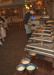 Selective focus. Row of Chafing Dishes at Event Buffet