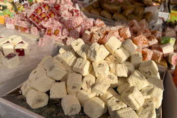 A slide of Turkish delight candies on a market stall