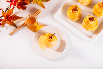 Pears in puff pastry dough drizzled with honey. Healthy and organic food.