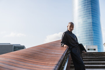Young LGBTQ man in urban outdoor setting