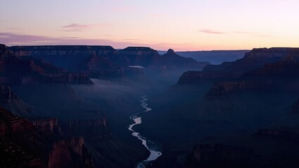 Misty Morning Sunrise Over the Grand Canyon River Valley.