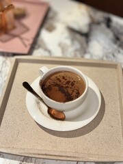 cup of coffee with cinnamon