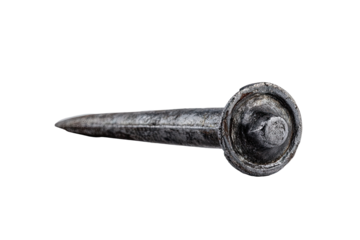 Close-up of a single, antique-looking nail.  Dark gray/black metal, pointed tip,  round head with a textured surface.  Isolated on black background