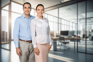 Fototapeta premium Two professional business woman and man in office
