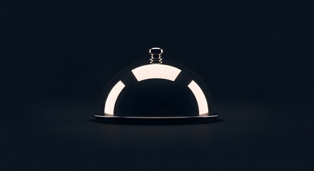 A gleaming silver cloche sits on a dark surface, hinting at a hidden culinary delight