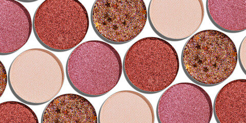Swatches eyeshadow refills as minimal geometric pattern banner on white. Glitter pans red, brown, purple, pink shades with sun shadows, detailed texture, cosmetic, beauty concept makeup, layout