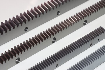 Linear metal gear line for machines support