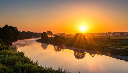 A serene sunrise over a flowing river. Golden light illuminates the landscape. A tranquil scene of nature's beauty. Mist hovers