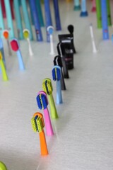 Nicely arranged toothbrushes in different colors