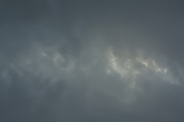 Obraz premium Dark Stormy Sky Background with Heavy Overcast Gray Clouds