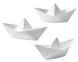 Three origami paper ships, white, arranged in a loose triangular formation