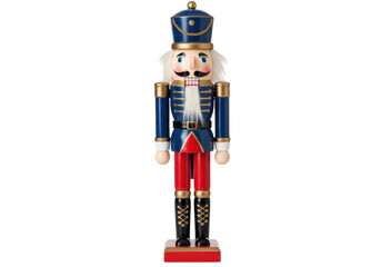 Isolated Nutcracker figurine of toy soldier wearing royal blue coat and red pants with details