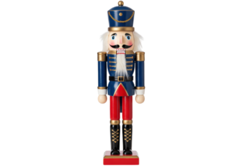 Isolated Nutcracker figurine of toy soldier wearing royal blue coat and red pants with details