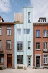 Fototapeta premium Modern narrow house design blends with traditional architecture in a charming urban street, showcasing a unique facade against neighboring buildings during daylight