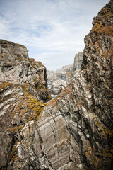 Towering granite cliffs stretch into the distance, creating a dramatic, awe-inspiring landscape.