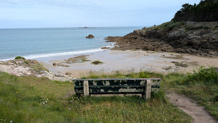 Coastal view with bench from the GR 34 trail near Dinard, Brittany, France