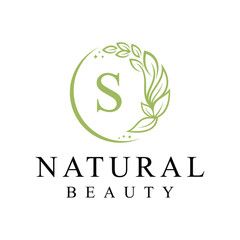 Initial letter s cosmetics beauty fashion logo design, green leaves natural logo graphics concept