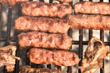 Grilled mititei, a traditional Romanian dish. These are small, uncased minced meat sausages, usually made from a mixture of beef, pork and lamb.